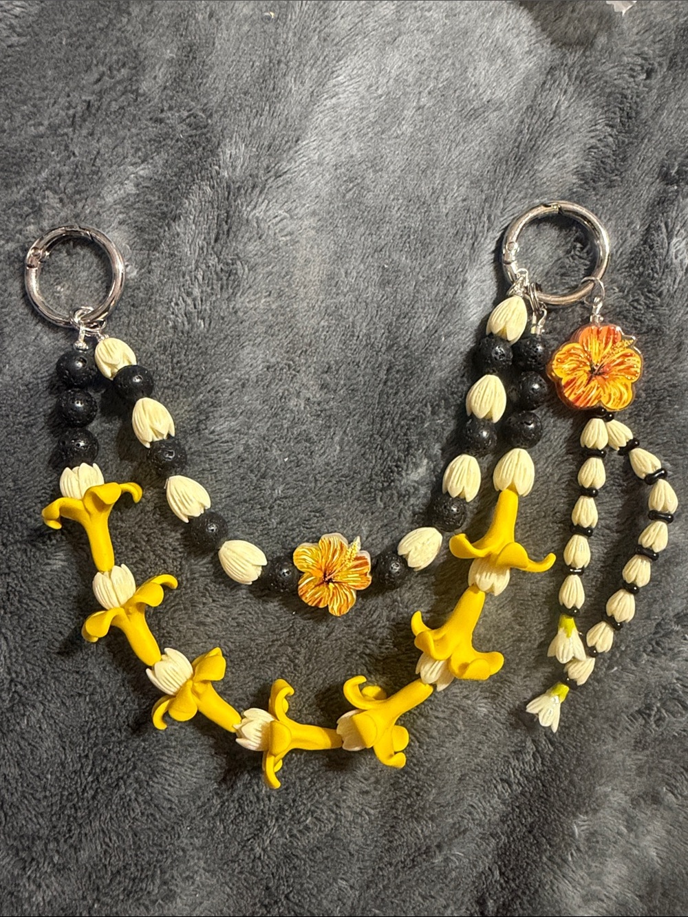 Handmade double strand Yellow Puakenikeni and Pikake purse lei.